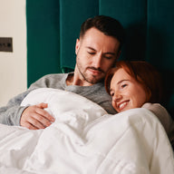 A couple lie in and enjoy their double heated duvet