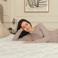 woman lying on a dreamland heated bamboo underblanket